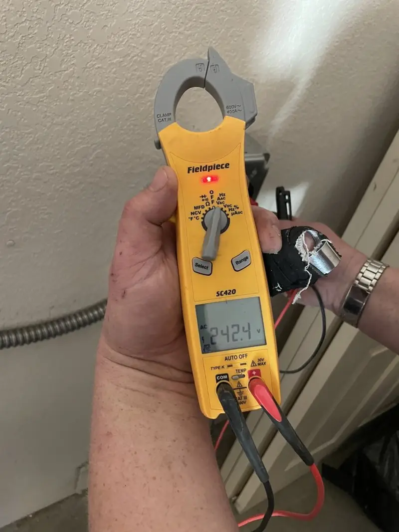 Voltage testing with clamp meter during Circuit Breaker Repair in Rogersville